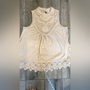 Xhileration adorable sleeveless knit top. With beautiful lace detail.